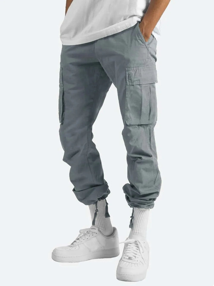 Nuevos pantalones cargo para hombre. Estilo de ocio europeo y americano con cordón y múltiples bolsillos. Pantalones largos de moda callejera.