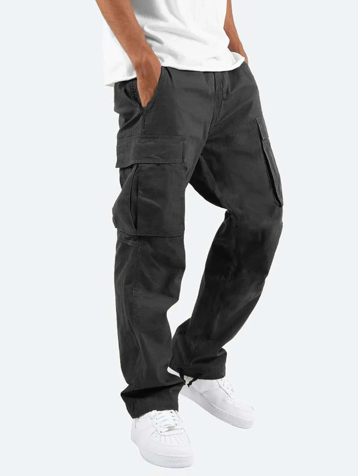 Nuevos pantalones cargo para hombre. Estilo de ocio europeo y americano con cordón y múltiples bolsillos. Pantalones largos de moda callejera.