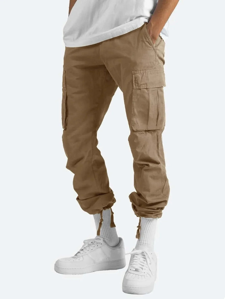 Nuevos pantalones cargo para hombre. Estilo de ocio europeo y americano con cordón y múltiples bolsillos. Pantalones largos de moda callejera.